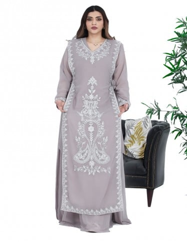 Luxurious evening Jalabiya with gemstone embroidery.
