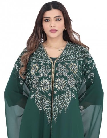 Luxurious evening Jalabiya with gemstone embroidery.