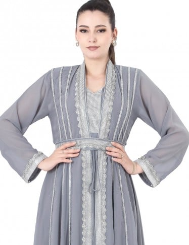 Grey jalabiya with silver embroidery, ideal for occasions.