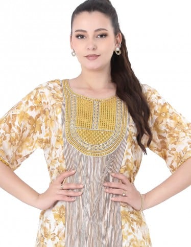 Yellow summer jalabiya with delicate patterns.