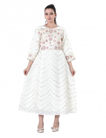White jalabiya with colorful embroidery.