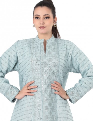 Light mint jalabiya with elegant front embroidery.