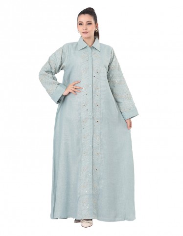 Mint shirt-style jalabiya with subtle embroidery.
