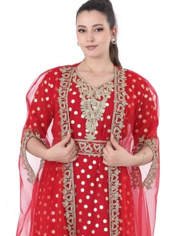 Red evening jalabiya with ornate embroidered cape.