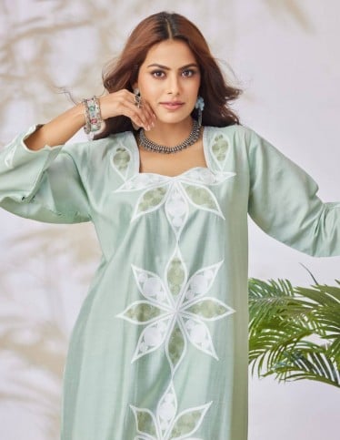 Green jalabiya with embroidery.