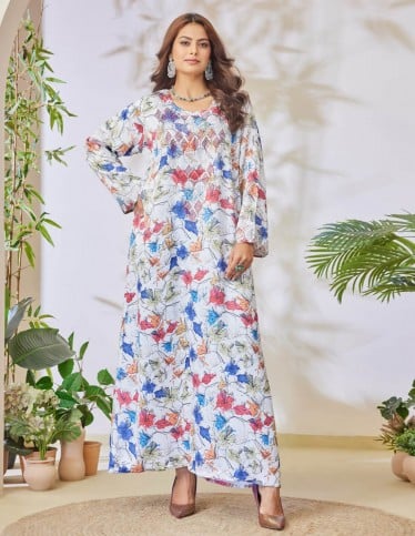 White jalabiya with colorful prints.