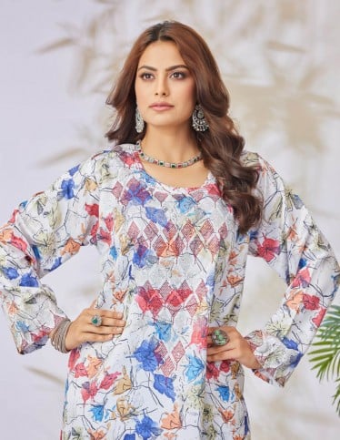 White jalabiya with colorful prints.