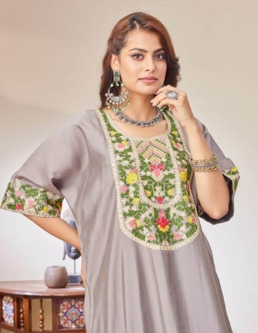 Gray jalabiya with floral embroidery.