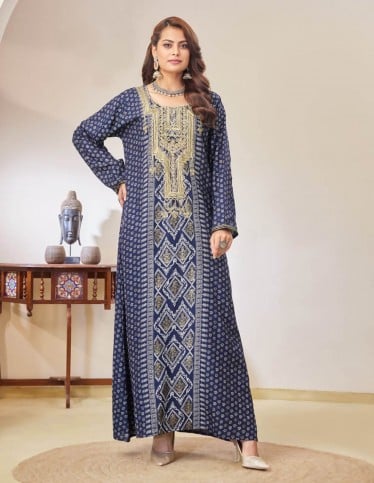 Navy jalabiya with geometric embroidery.