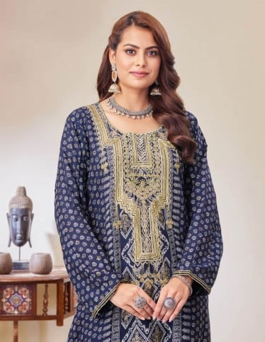 Navy jalabiya with geometric embroidery.