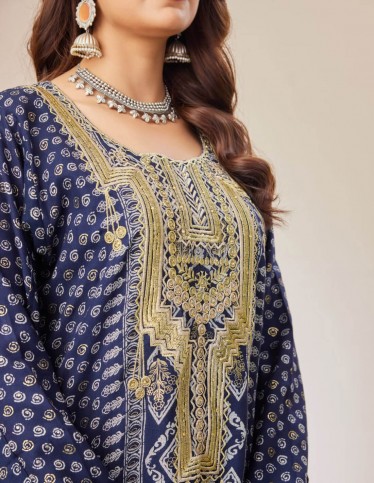 Navy jalabiya with geometric embroidery.