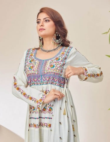 White jalabiya with heritage embroidery.