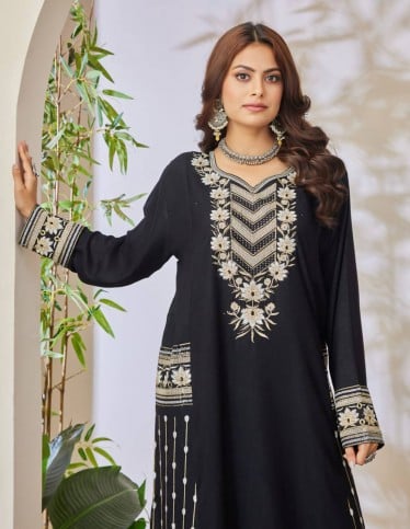 Black jalabiya with silver embroidery.