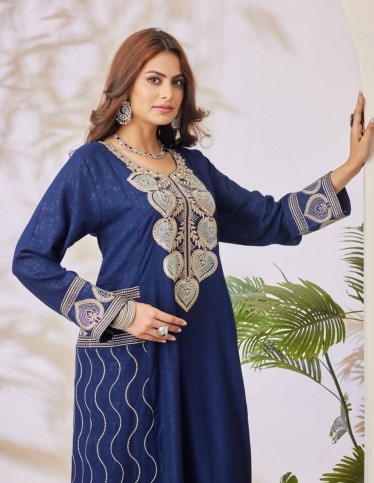 Navy jalabiya with distinctive embroidery.