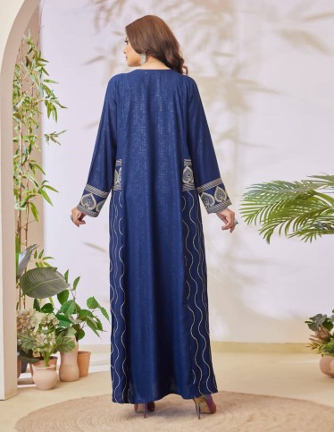 Navy jalabiya with distinctive embroidery.