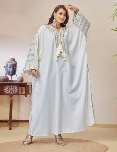 Jalabiya with golden embroidery.