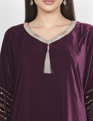 "Al-Reem" Velvet Gown – Embroidered Neckline & Flared Statement Sleeves.