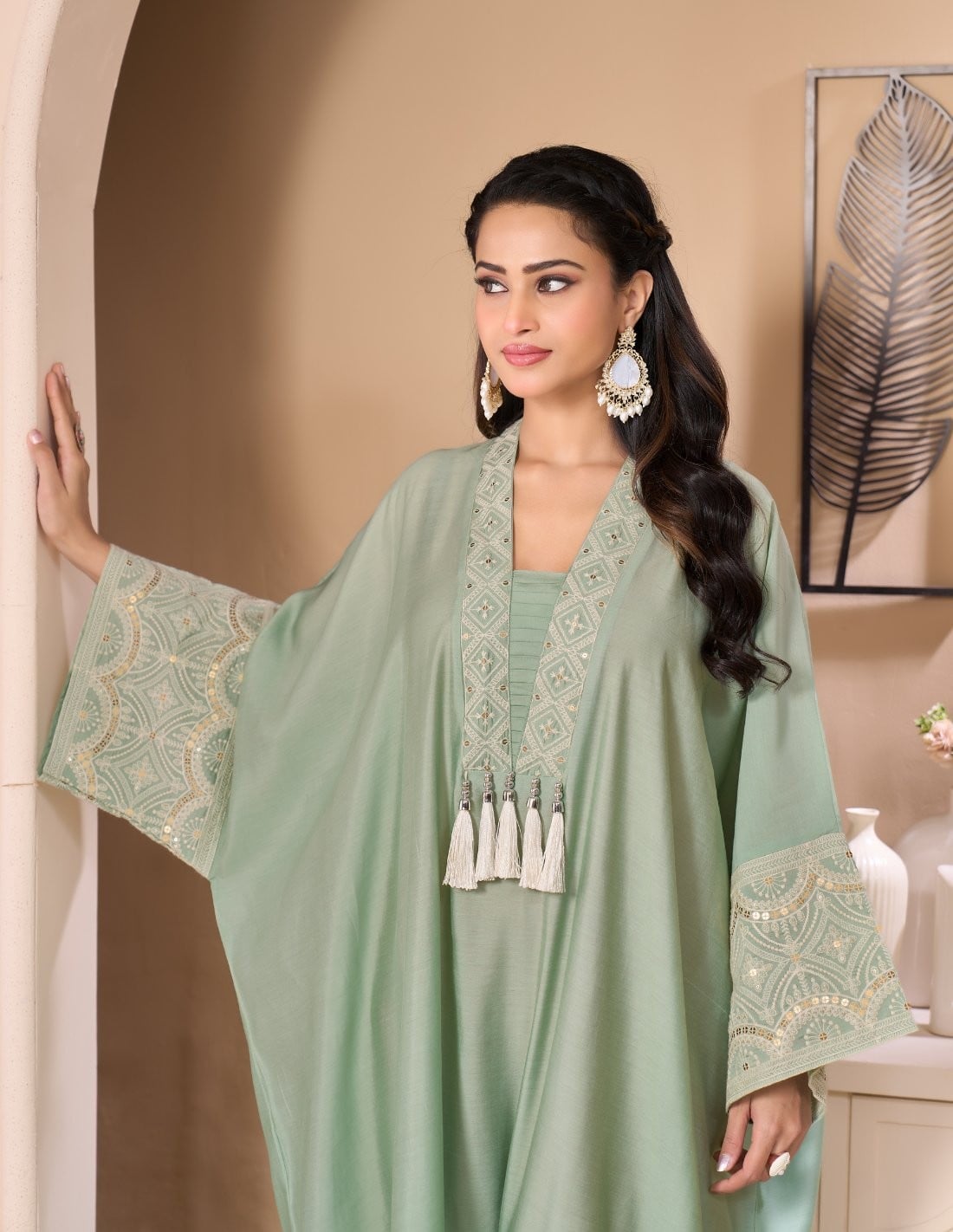 Mint Green Kaftan Jalabiya with Embroidered Neckline and Pearl Tassels