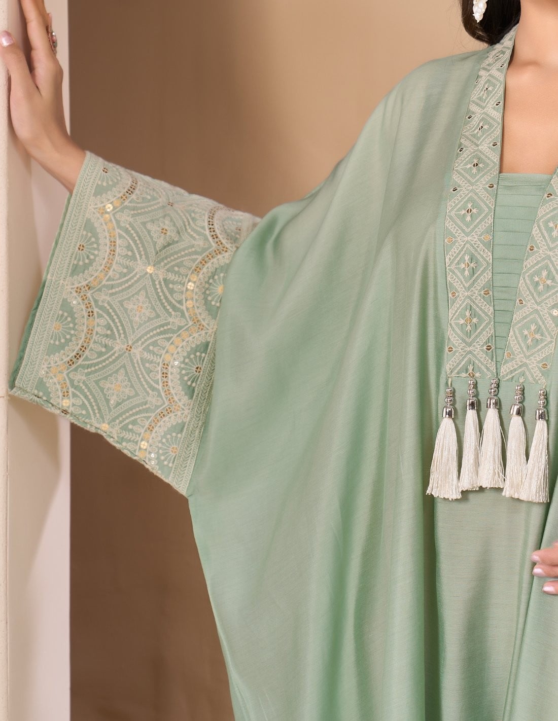 Mint Green Kaftan Jalabiya with Embroidered Neckline and Pearl Tassels