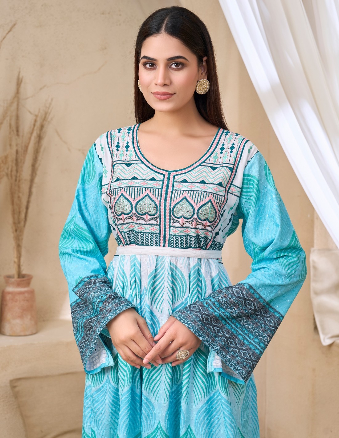 Vibrant Turquoise Jalabiya with Intricate Patterns