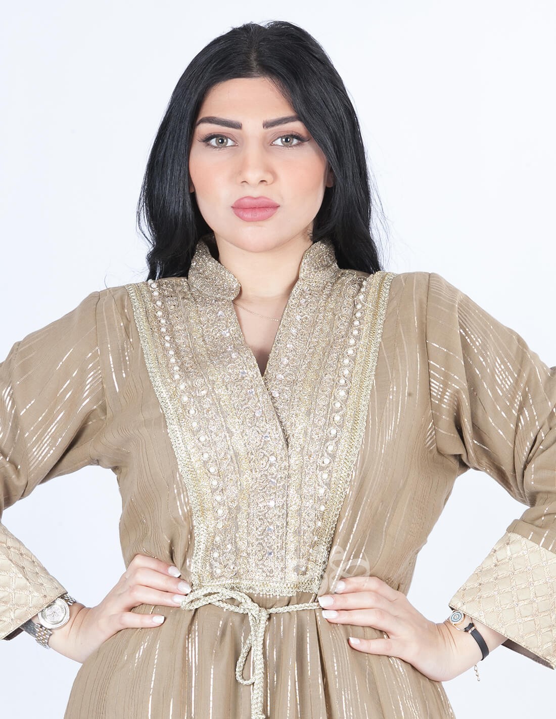 A luxurious galabia, golden embroidery and striped fabric with a belt